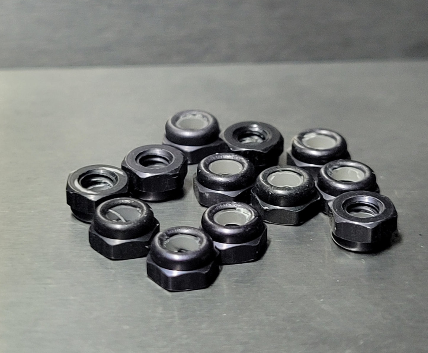 (12 Pack) 4-40 Sm Pat 3/16 Hex LockNut (12) Aluminum Black